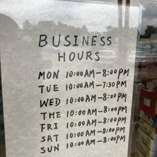 a business hours sign