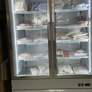 a display of meat and cheeses