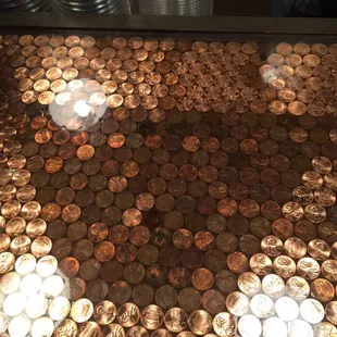 Love the coffee cup bar made with pennies