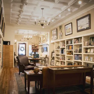 a living room with bookshelves