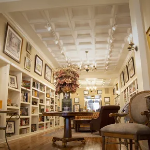a living room with antique furniture