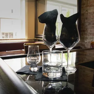 two empty wine glasses on a table