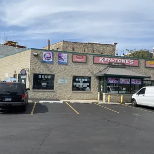 a car parked in front of the store