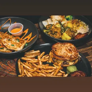 three plates of food on a table