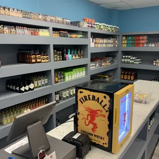 a liquor store with shelves of liquor