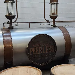 three wooden barrels