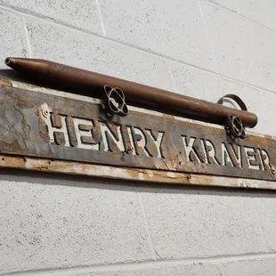 The founder's name plate with whiskey thief