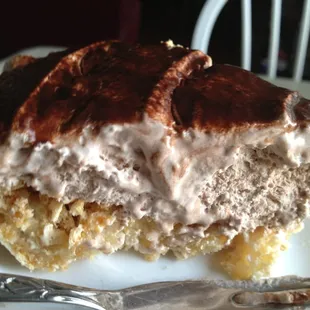 a piece of cake on a plate with a fork