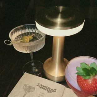 Dirty martini and strawberry pisco