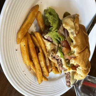 a plate with a sandwich and french fries