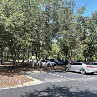 several cars parked in a parking lot