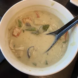 Green curry. The portion is larger and it&apos;s served with rice. I ate some before so remembered to photograph it.