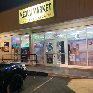 a car parked in front of the store
