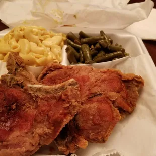 Fried pork chops w/ hotsauce, mac and cheese, and green beans.