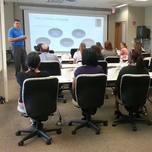 Dr. Kepler giving a health presentation at a local business.