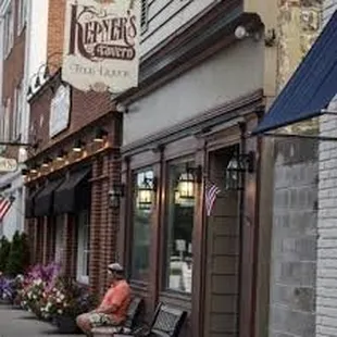 a man sitting on a bench