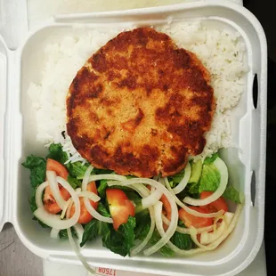 Salmon burger in top of rice with salad !!! Homemade meal !