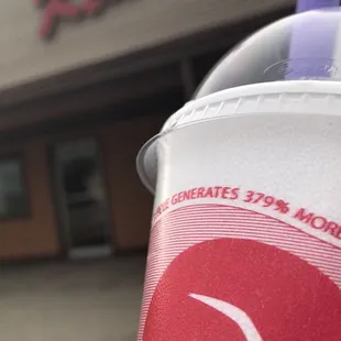 a drink in a plastic cup