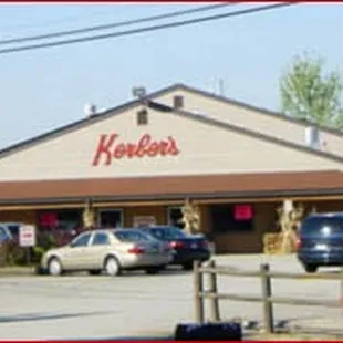cars parked in front of the store