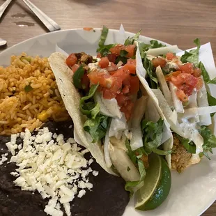Fried avocado tacos, rice and beans