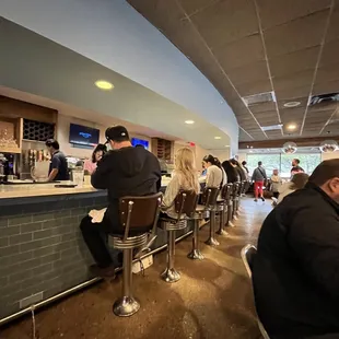 a man sitting at the bar