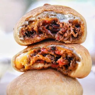 a close up of a sandwich cut in half