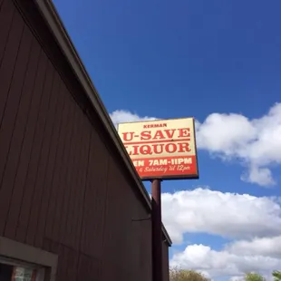 a sign for u save liquor