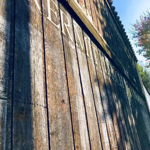 The exterior wooden walls.