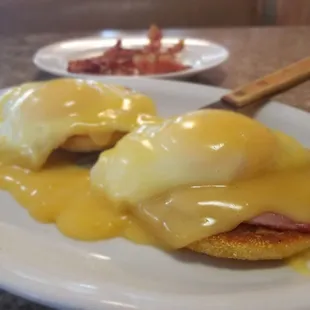 Eggs Benedict with a side of bacon.