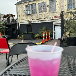 a pink drink on a table