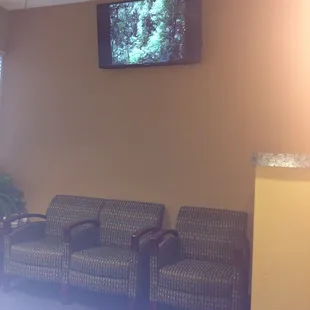 Relaxing video and comfy chairs in waiting room.