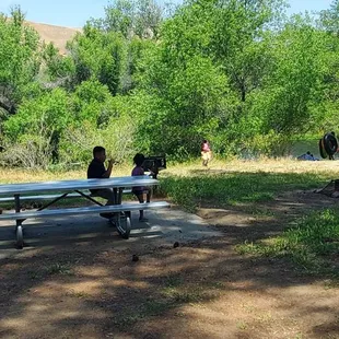 I don't know who these kids or people are, but they just came and sat our table and starting using our campsite while we were still there.