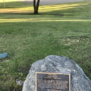 Signage introducing Yowlumne volleyball park area and discussing the Yowlumne Native American tribe in Bakersfield