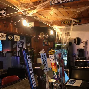 a bar with a lot of signs