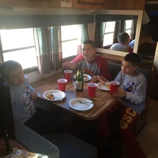 My 3 kids fighting me to finish breakfast in the trailer instead of being outside and exploring nature!