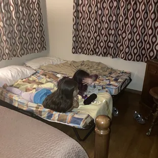 Each room had an extra cot.