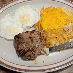 Steak and eggs with cheese on the hashbrowns. $11.99