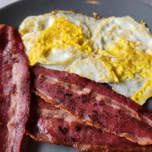 Crisp turkey bacon &amp; two over-hard eggs.