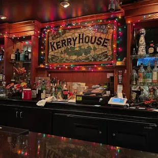 a bar with christmas lights