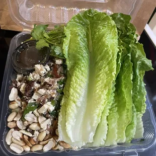 Namm kao vientiane with tofu.  Romaine lettuce obscuring much of the yumminess.