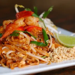 a plate of pad thai food