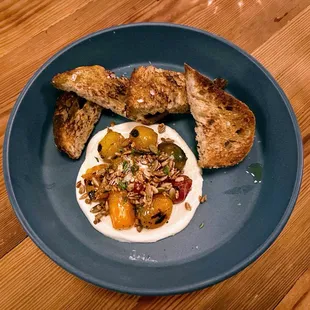 a plate of food on a wooden table