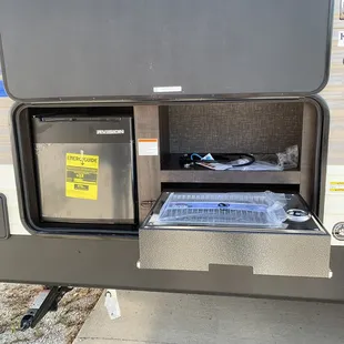 Outdoor kitchen comes equipped with a propane grill not the typical burner stoves