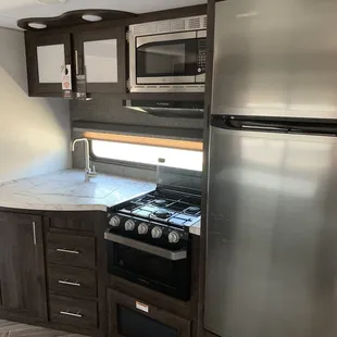 Kitchen with larger fridge