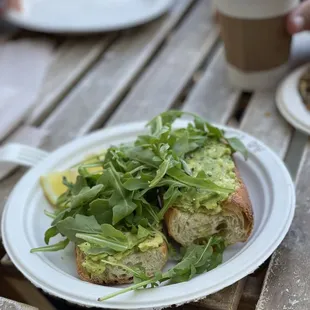 a plate of food on a wooden table