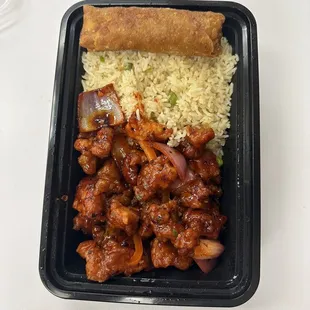 General Tso with fried rice and Egg Roll to go! Delicious, will ask for extra spicy next time.
