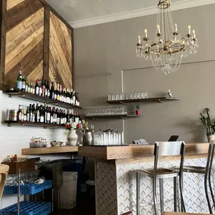 a bar with a chandelier