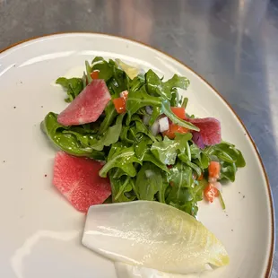 Arugula &amp; Endive Salad - Honey Vinaigrette, Watermelon Radish, Toasted Almonds, Queso Oaxaca, Tomato, Red Onion, Creme Fraiche