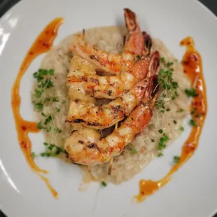 Grilled Prawns served over coconut risotto