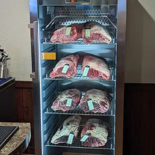 We have our own Dry age cabinet! This process makes our steaks melt in your mouth delicious
